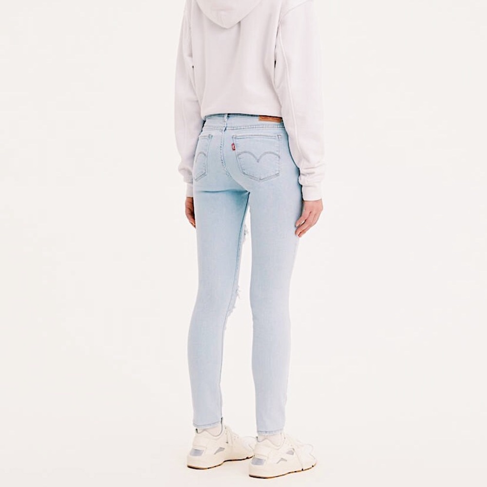 Levi’s 711 skinny white light wash jeans 25